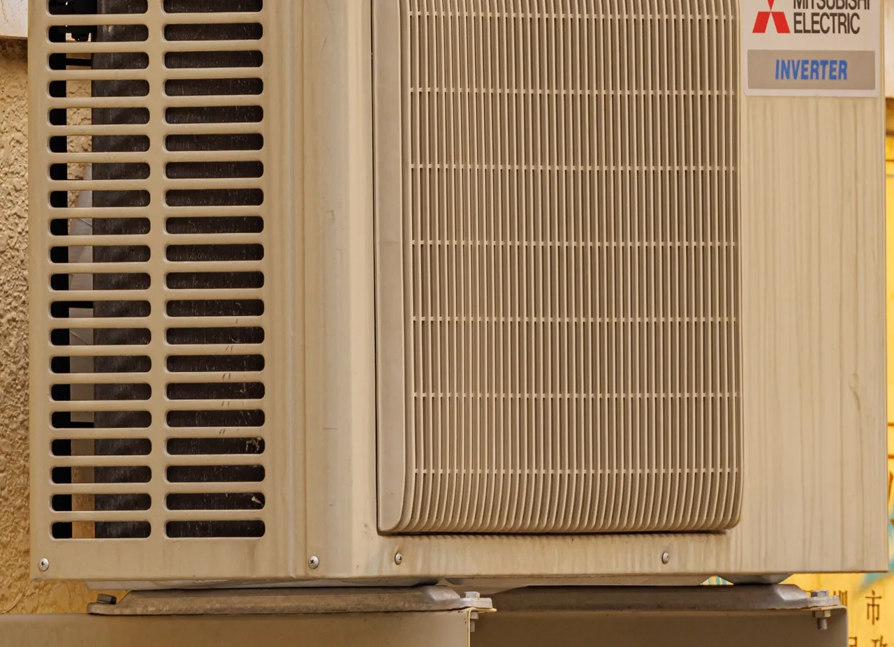 Mitsubishi Electric inverter outdoor unit of the kind Synergie AC Repair & Installation installs