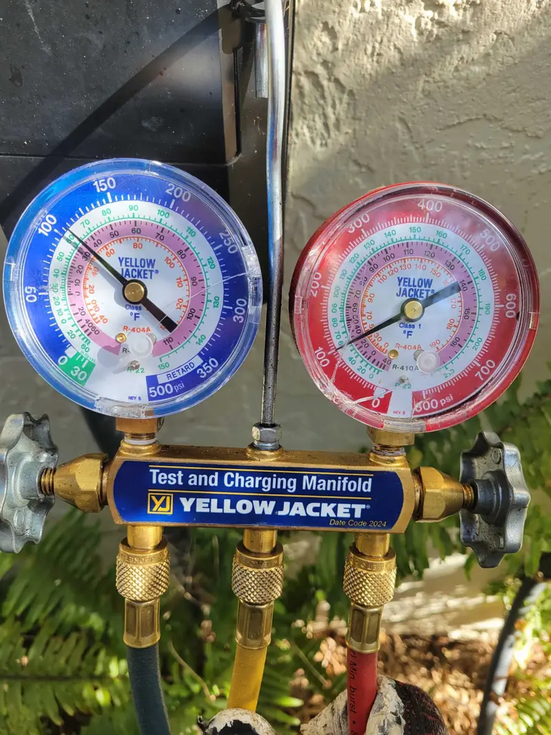 Yellow Jacket manifold gauges during a charge check
