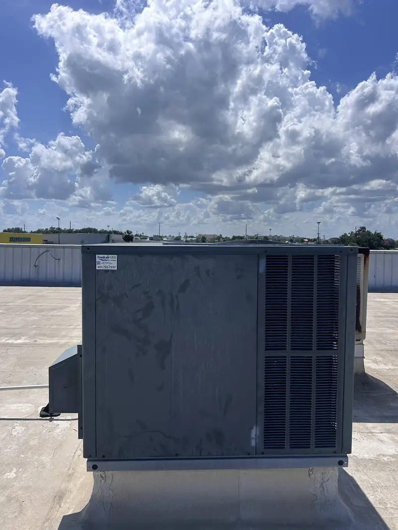 Rooftop packaged unit on a flat commercial roof