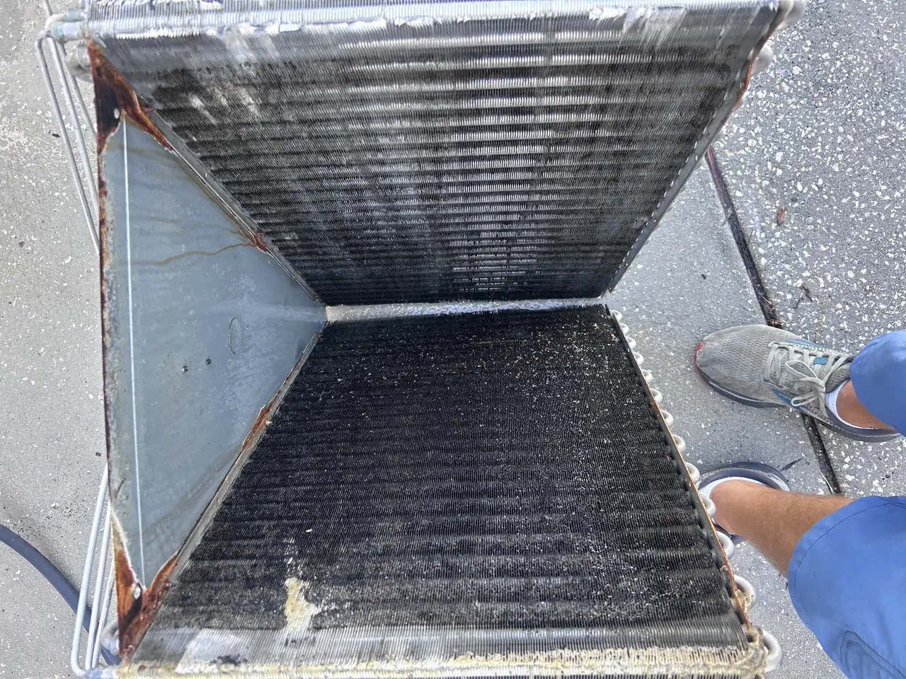 Heavily soiled ductwork interior before cleaning