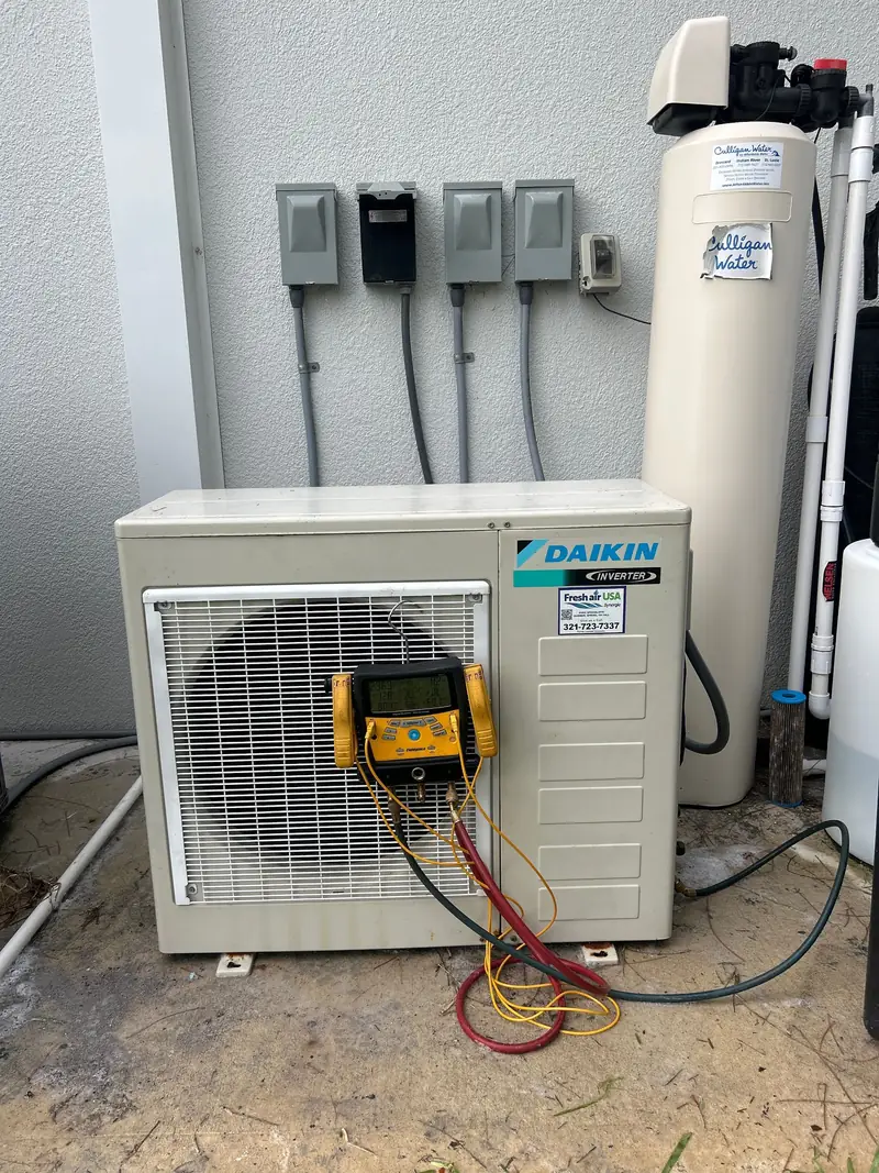 Daikin mini-split air handler beside water treatment equipment