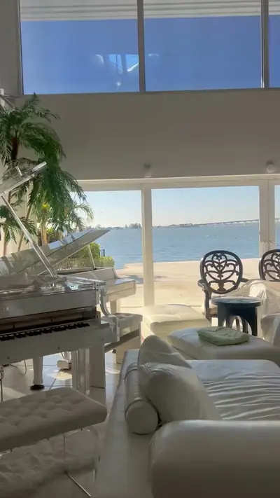 Bright waterfront living room kept comfortable year round