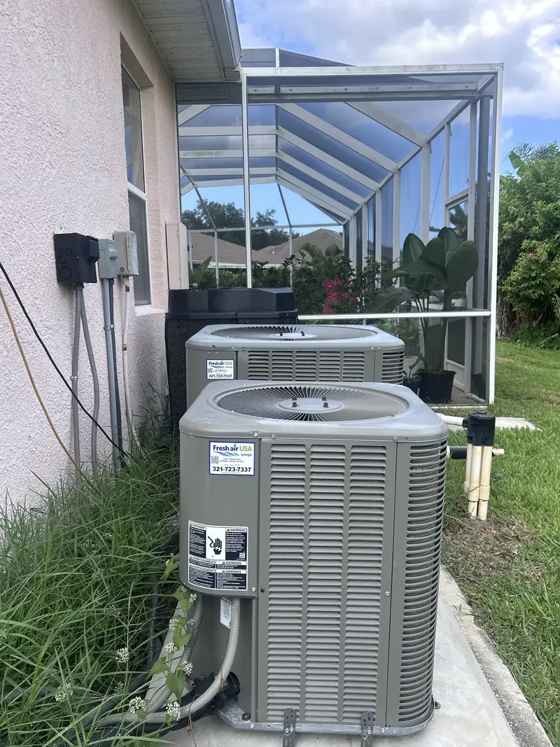 Pair of condensers serving a single residence