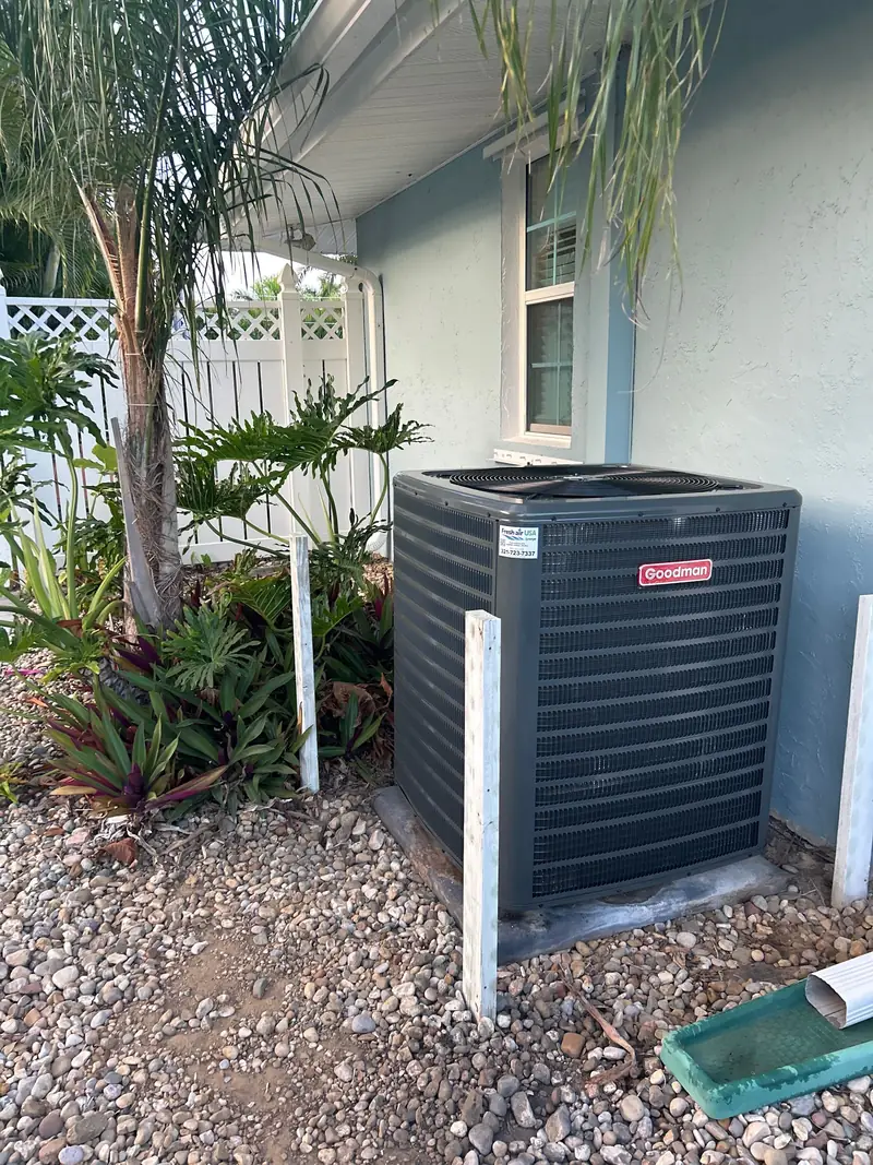 Condenser unit set on landscaping stone