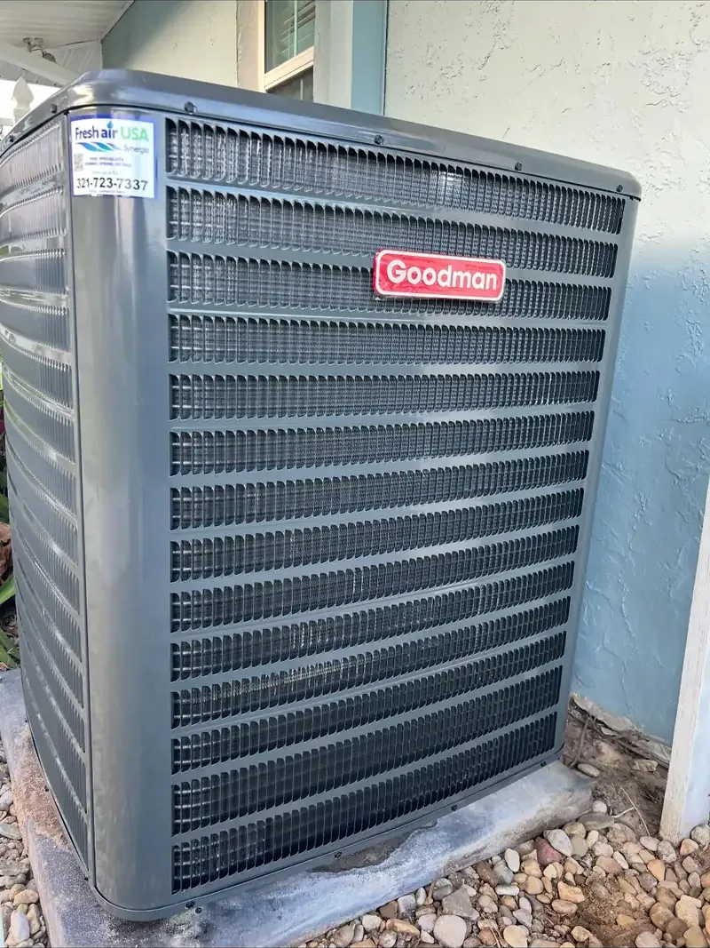Residential condensing unit on a stone bed